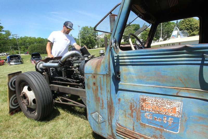 Jesse Amato, of Wauconda looks at the engine of his 1947 Willy's Panel Delivery Truck featured at the 30th Annual Car Show during Wauconda Fest in Wauconda.  (6/26/22)