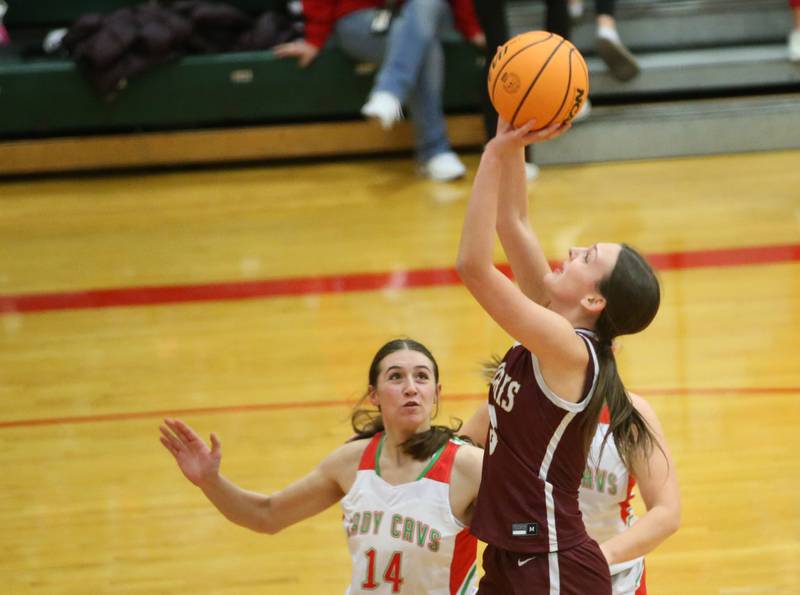 Morris's Lily Hansen shoots a jump shot over L-P's Drew Depenbrock on Friday, Dec. 6, 2024 in Sellett Gymnasium at L-P High School.