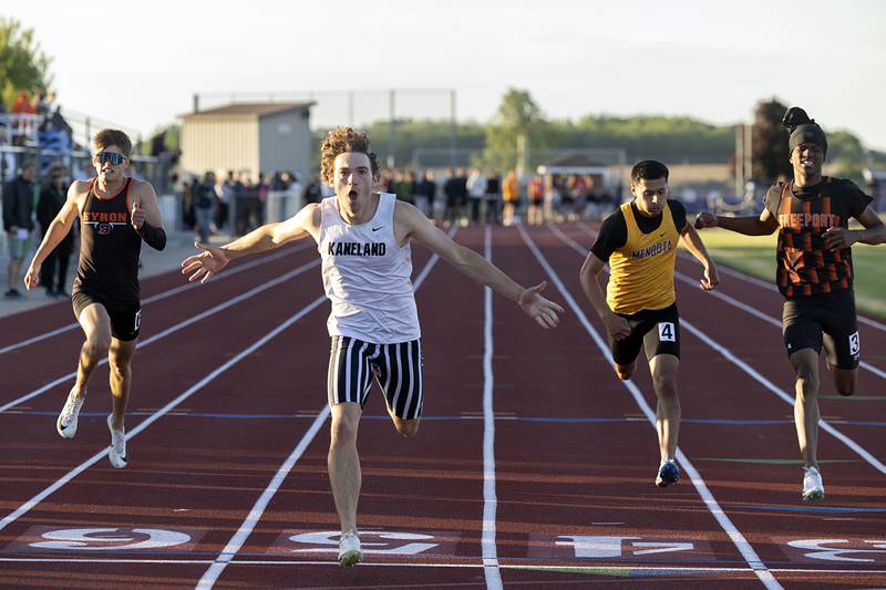 Kaneland’s Benjamin Karl celebrates his heat win in the 200 dash Wednesday, May 20, 2026, at the Rochelle Class 2A boys track sectionals.