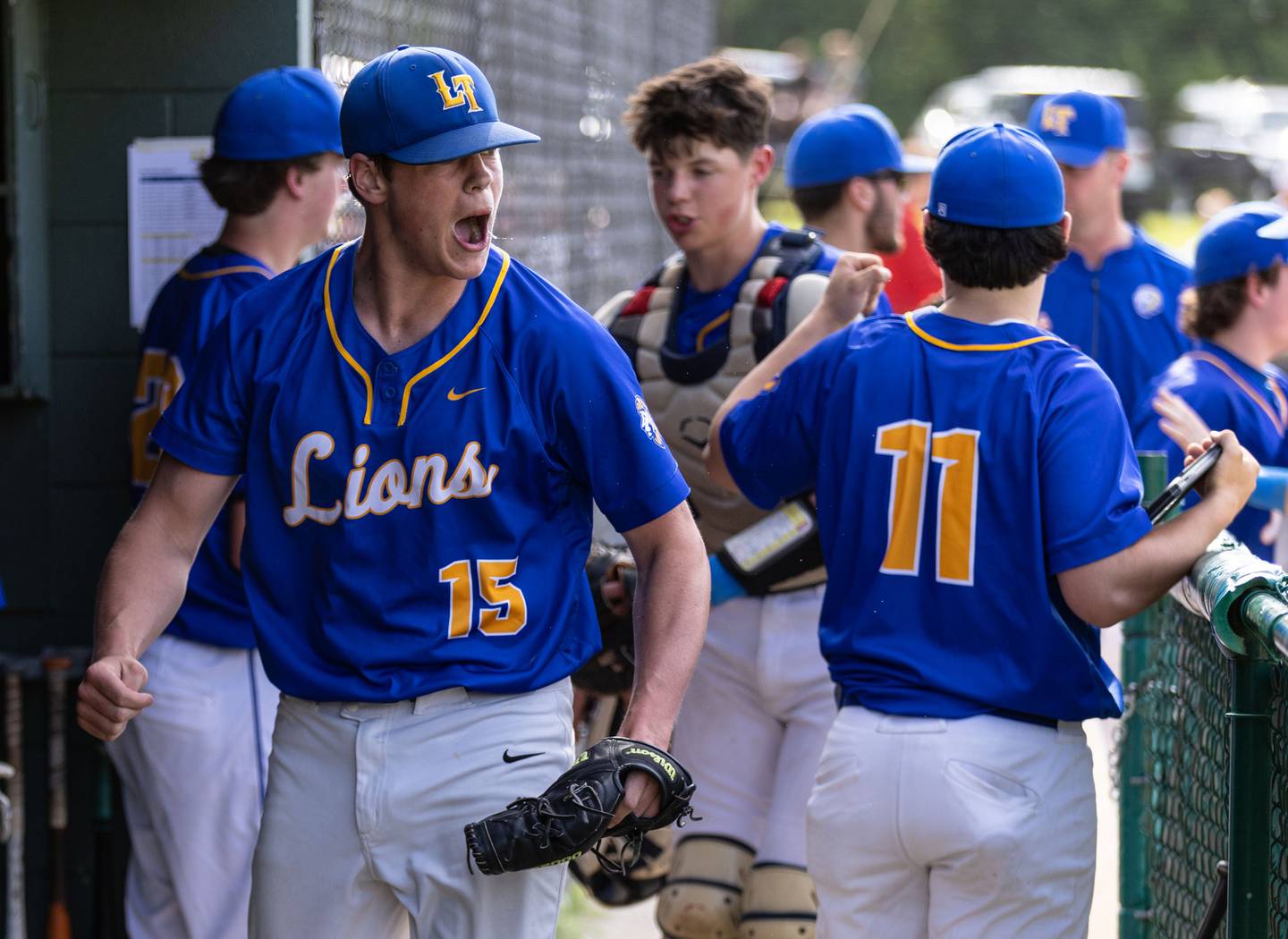 Lyons Township pitcher Tucker King celebrates three strikeouts during the first inning of a game against Downers Grove North in Downers Grove on Monday, May 12, 2025.