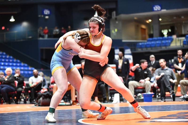 Madeline Zerafa-Lazarevic of Schaumburg, right, wrestles in her 145-pound championship match in the IHSA Girls Individual State Finals on Saturday, March 1. Zerafa-Lazarevic took second place to Taylor Dawson of Collinsville.