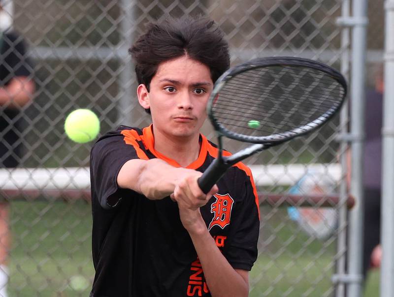 DeKalb number two singles player Jahan Islam hits a forehand Thursday, April 24, 2025, during their match at Sycamore High School.