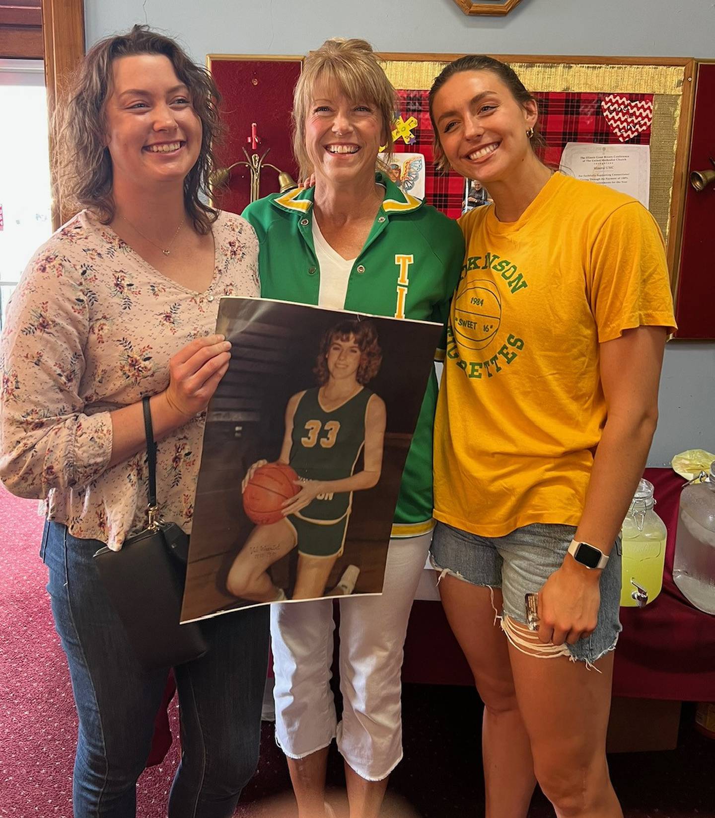 Val (Wancket) VanHyfte, who spoke in Saturday's Bureau County Basketball History event, is flanked by her daughters Celina (left) and Jade. All three were 2,000-point scorers.