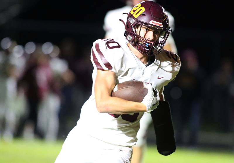 Richmond-Burton’s Luke Johnson scampers in for a two-point conversion against Aurora Central Catholic in IHSA football Class 3A second-round playoff action at Bob Stewart Field on the campus of Aurora Central Catholic High School in Aurora on Friday, November 7, 2025.