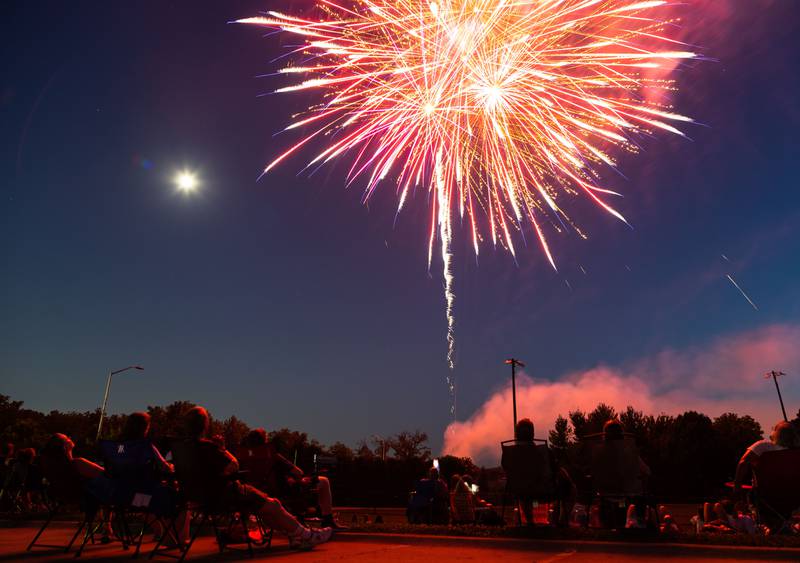 Spectators watch the “July 4th Fireworks” at Langum Park in St. Charles on Friday, July 4, 2025.