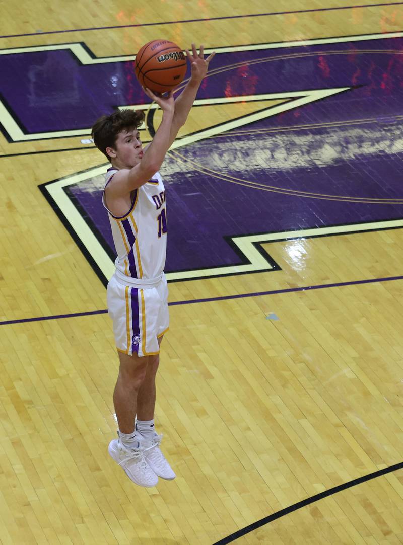 DGN's Owen Thulin (11) takes a jump shot during the boys 4A varsity regional final between Downers Grove North and Proviso East in Downers Groves on Friday, Feb. 24, 2023.