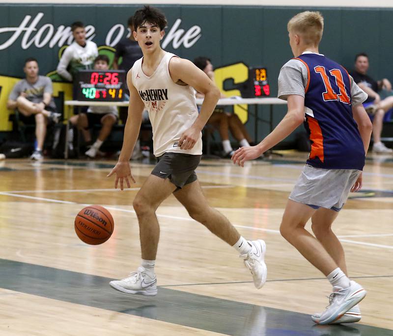 Woodstock's Spencer Cullum, McHenry's Marko Visnjevac and Crystal Lake South's AJ Demirov during a game Friday, June 23, 2023, in the Crystal Lake South Gary Collins Shootout, at the high school in Crystal Lake.