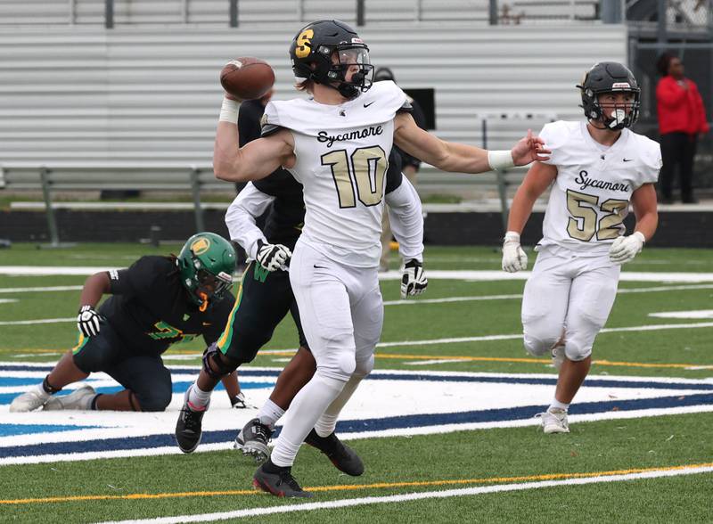 Sycamore's Burke Gautcher throws a touchdown pass late in the first half Saturday, Nov. 9, 2024 during their Class 5A second-round playoff game against Westinghouse at Knute Rockne Stadium in Chicago.