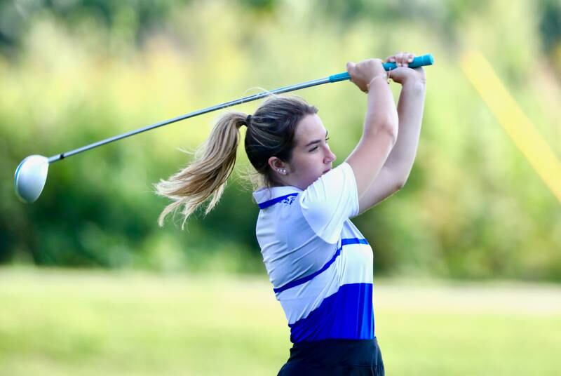 Princeton's Halli Peterson watches her drive Thursday a Wyaton Hills.