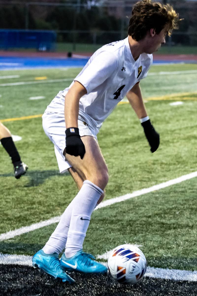 Andrew's Will MacLeod looks for an open teammate during the 3A L-W East Regional boys varsity soccer match against Joliet West at Lincoln-Way East on Oct. 21, 2025.