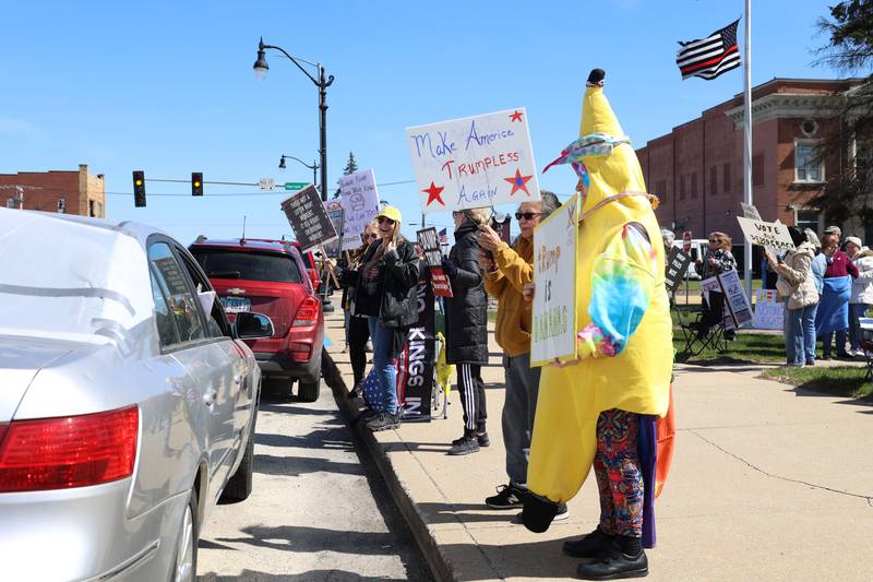 Protesters participate in the No Kings rally at the Kankakee County Courthouse on March 28, 2026.