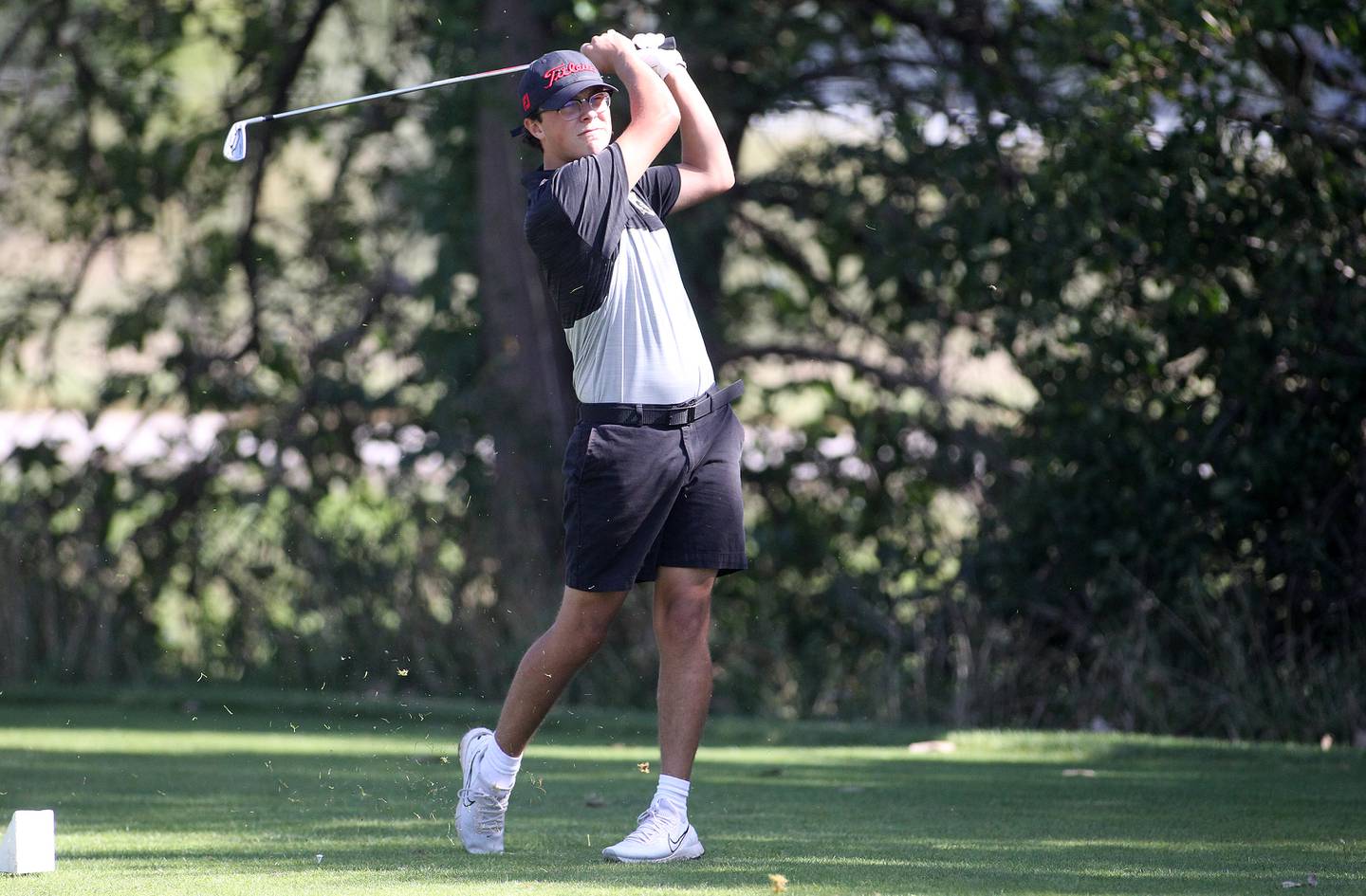 Sycamore's David Beaty tees off during the Interstate Eight Conference meet at Bliss Creek Golf Course in Sugar Grove on Monday, Sept. 27, 2021.