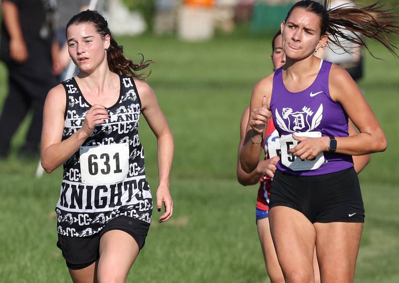 Kaneland’s Danielle Bower makes a turn Tuesday, Sept. 2, 2025, during the Sycamore Cross Country Invitational at Northern Illinois University in DeKalb.