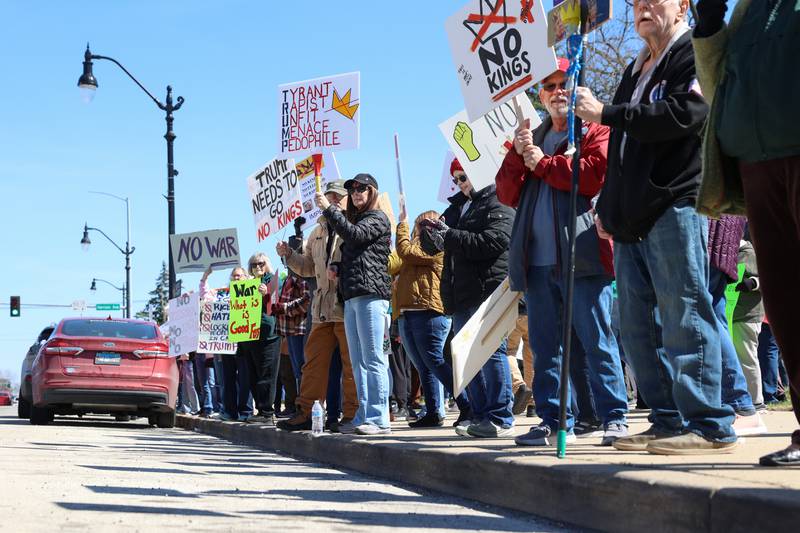 Protesters participate in the No Kings rally at the Kankakee County Courthouse on March 28, 2026.