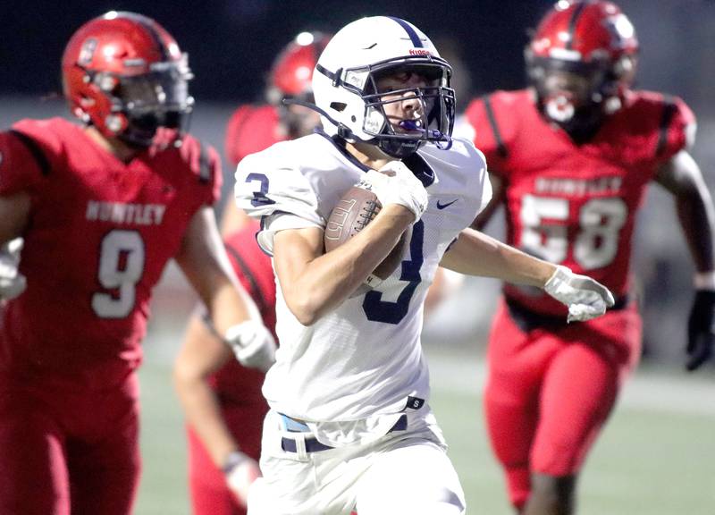 Cary-Grove’s Ty Tenopir hustles in for an early touchdown in varsity football at Huntley High School in Huntley on Friday, Sept. 19, 2025.