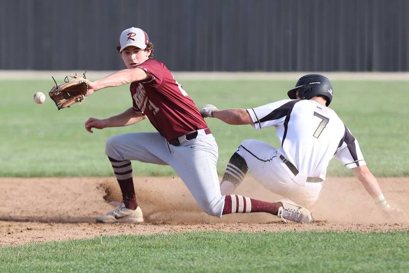 Sycamore's Kiefer Tarnoki steals second as Morris' Nazim Baftiri  fields the throw during their game Tuesday, May 9, 2023, at the Sycamore Community Sports Complex.