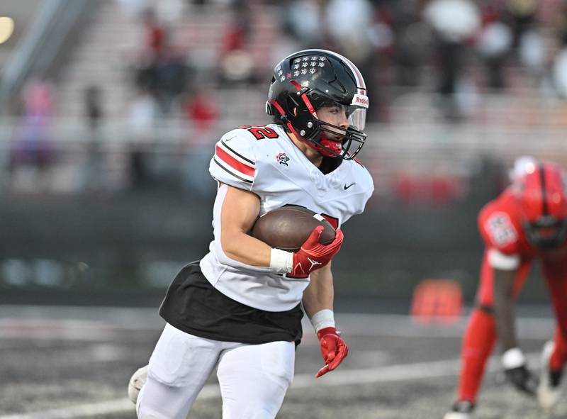 Lincoln-Way Central's Anthony Noto runs the ball during a non-conference game against Bolingbrook on Friday, Sep. 29, 2023, at Bolingbrook. (Dean Reid for Shaw Local News Network)