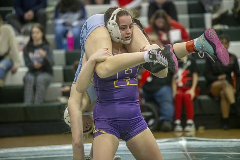 Grace Laird of Joliet Catholic High School wrestles Angelina Cassioppi of Hononegah Community High School earning her second place at sectionals in Geneseo on February 10, 2024.