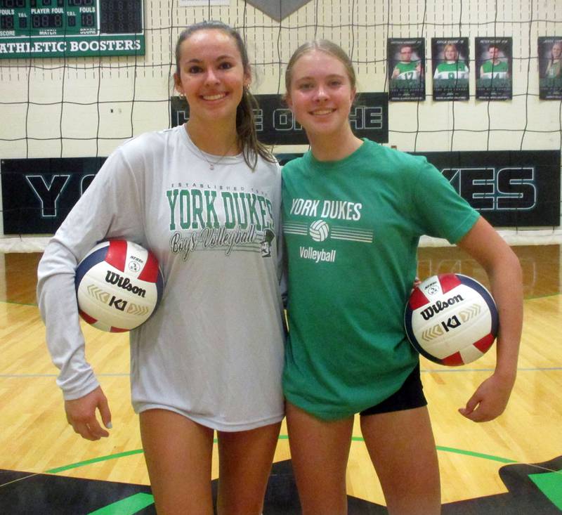 York volleyball's Emelyn Stettin (left) and Jessie Trapp