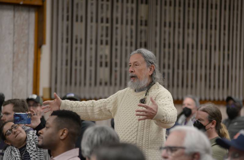 Oak Lawn resident William Beaulieu asks to be heard on his concerns with the unrest between Palestinians and Israelis and asks US Rep Sean Casten why he does not attend town hall meetings in Cook County during the Downers Grove Town Hall meeting Wednesday March 19, 2025.