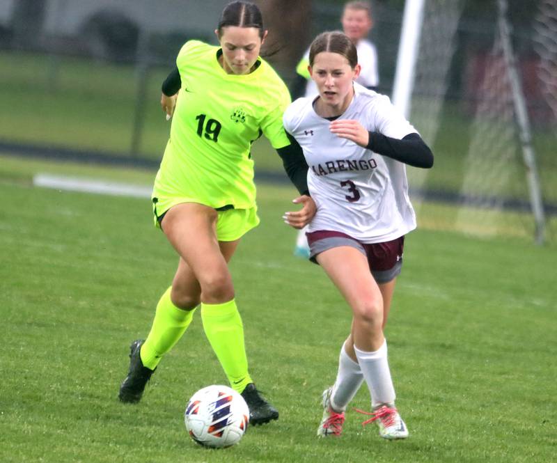 Marengo’s Maggie Hanson, right, battles Richmond-Burton’s Hannah Denman for the ball in IHSA Class 1A Regional Title Game action soccer at Marengo High School in Marengo on Wednesday, May 21, 2025.