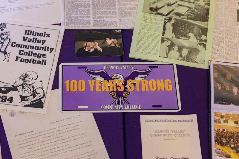 A table with various articles from Illinois Valley Community College's history was put on display outside of Dr. Mary Margaret Weeg Cultural Centre, on April 25, 2024.