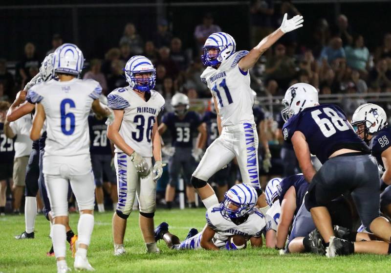 Princeton's Noah LaPorte points Tiger ball after Andrew Peacock recovers the ball at Monmouth-Roseville Friday night. Princeton won 40-0.