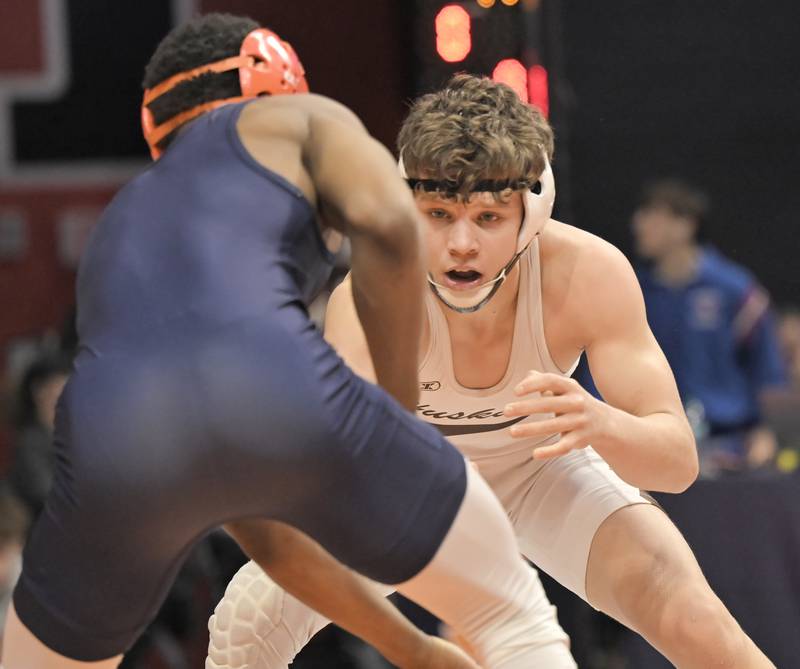 Hersey’s Oleksandr Havrylkiv faces Oak Park’s Jamiel Castleberry in the Class 3A 126-pound match at the boys IHSA wrestling finals at State Farm Center in Champaign on Saturday, Feb. 21, 2026.