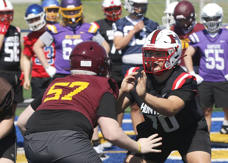 Richmond-Burton's Mason Lowry and Huntley's Uriel Aguirre showcase their skills at the Northern Burbs Football Showcase on Monday, May 4, 2026, at Johnsburg High School. Over 165 players from 15 teams demonstrated their football skills to over 60 college coaches.