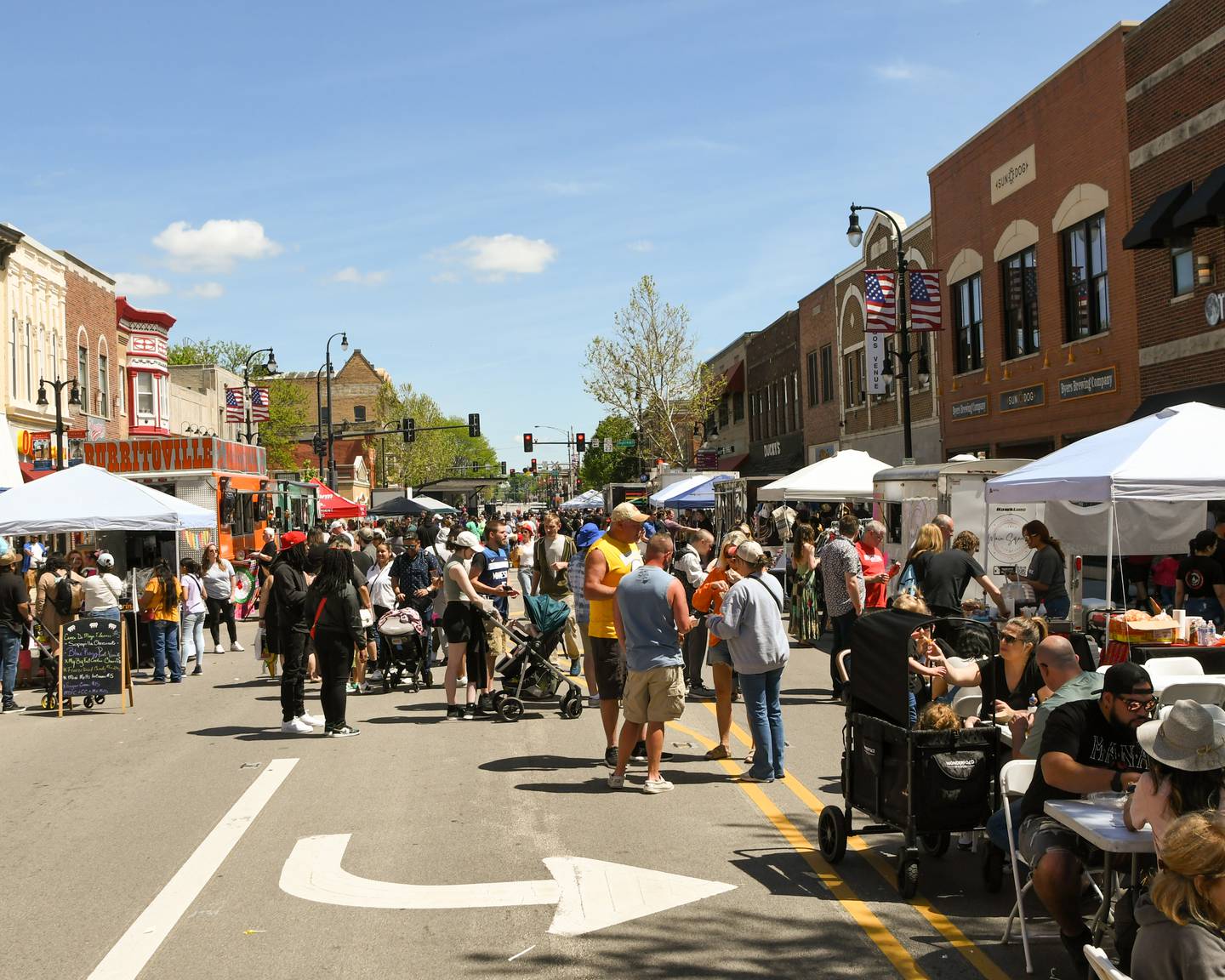 Crowds gather in a blocked off section of Lincoln Highway in downtown DeKalb on Sunday, May 5, 2024, to take part in the second annual Cinco de Mayo Celebration.