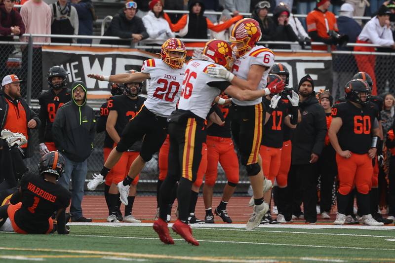 Batavia’s defense celebrates a broken up pass for a turn over on down in the final minutes against Lincoln-Way West on Saturday, Nov. 9, 2024 in New Lenox.