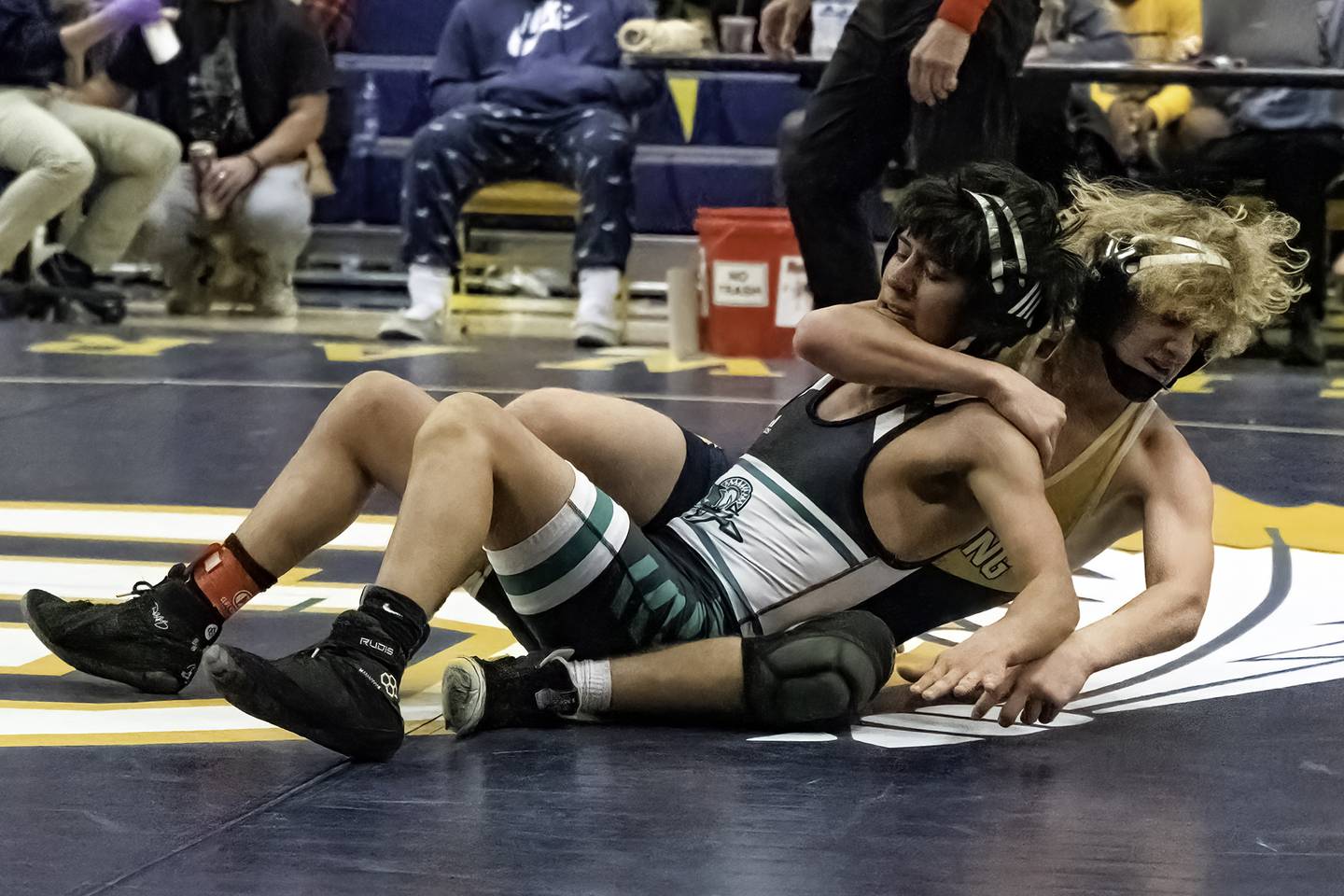 Sterling's Zyan Westbrook (right) goes for the pin against Oak Lawn's Eduardo Delacruz during their 120-pound title bout at the 44th annual Carson DeJarnatt Tournament on Saturday, Dec. 3, 2022 at Musgrove Fieldhouse in Sterling.