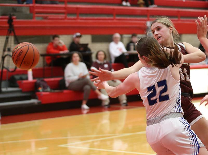 Morris's Layken Callahan and Princeton's Camryn Driscoll miss a rebound opportunity during the Lady Pirate Holiday Tournament on Wednesday, Dec. 20, 2023 in Kingman Gym.