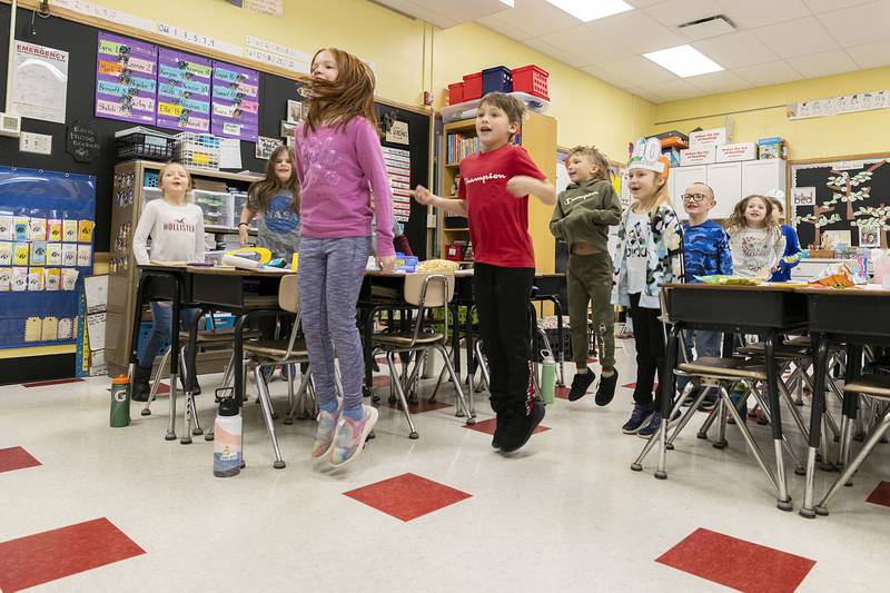 Dixon’s Jefferson School second grade students hop 100 times in class Thursday, Jan. 26, 2023 in recognition of 100 days of school. Before the exercise, the students estimated how much time it would take to complete the hops. Students and teacher alike finished in just under 58 seconds.