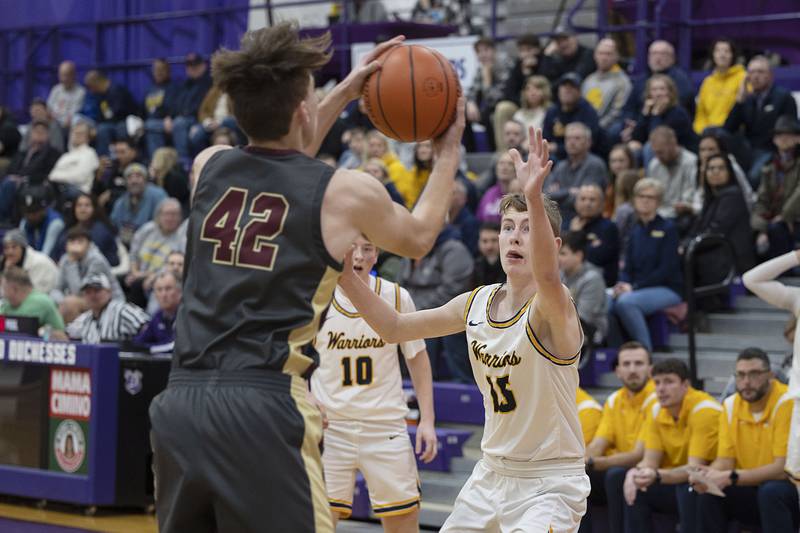 Sterling’s Rowan Workman guards Morris’ Bennett Ammer Wednesday, Feb. 22, 2023 in the 3A sectional semifinal game.