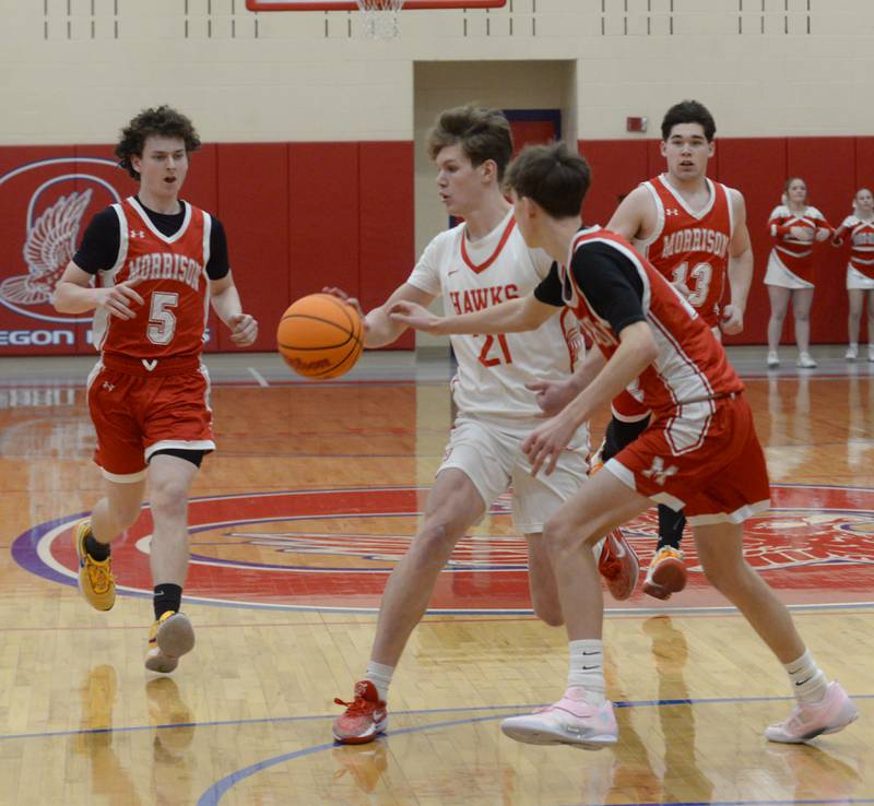 Oregon's Tucker O'Brien (21) tries to keep the ball away from Morrison defenders on Saturday, Jan. 11, 2025 at the Blackhawk Center in Oregon.