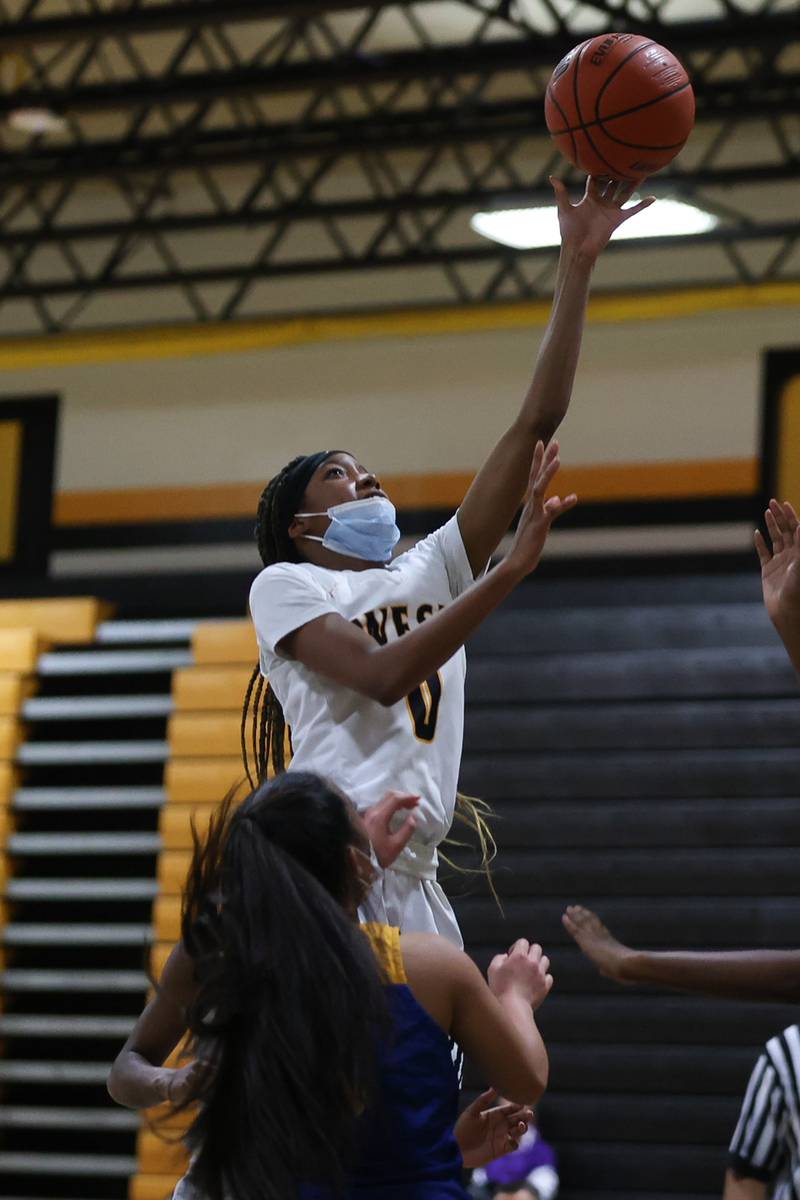 Joliet West’s Lisa Thompson lays in a shot against Joliet Central in the Class 4A Moline Regional semifinal. Tuesday, Feb. 15, 2022, in Joliet.