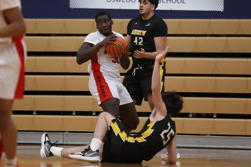 Bolingbrook’s Michael Osei-Bonsu draws a foul after a rebound against Andrew in the Class 4A Oswego Sectional semifinal. Wednesday, Mar. 2, 2022, in Oswego.