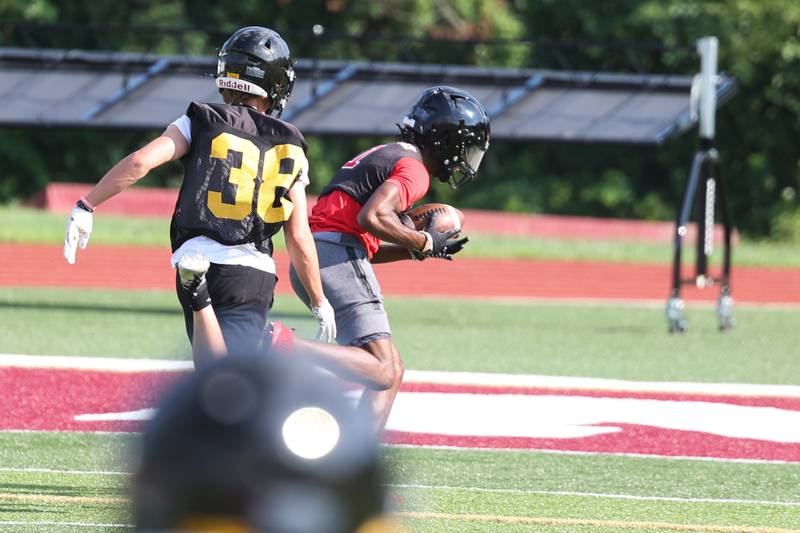 Bolingbrook’s I’Marion Stewart pulls in a pass for a score at the Morris 7 on 7 scrimmage. Tuesday, July 19, 2022 in Morris.