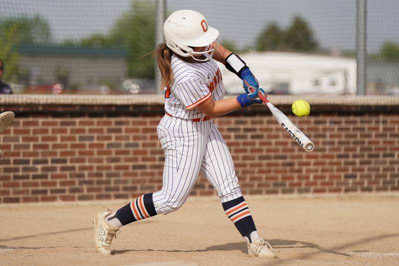 Oswego’s Kennedy Gengler connects for a double against Yorkville during a softball game at Oswego High School on Thursday, May 15, 2025.