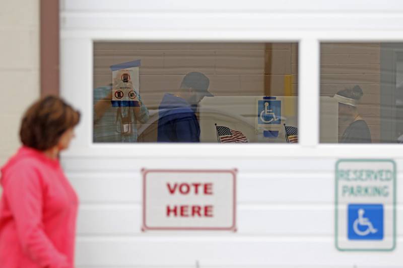 A voter votes on Monday, Nov. 4, 2024, at the Algonquin Township Office at 3702 US Hwy 14, in Crystal Lake.