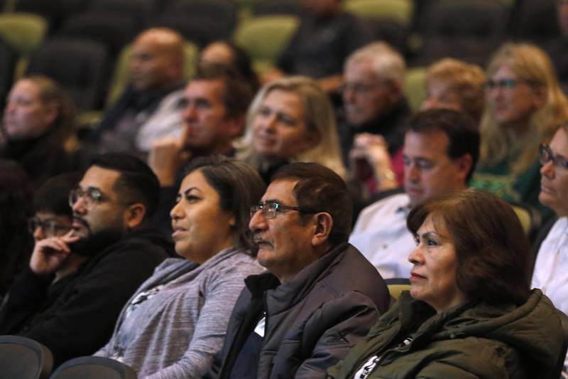 Parents listen to players talks about the season during a celebration for the Crystal Lake South boys soccer team on Wednesday, Nov. 8, 2023, at Crystal Lake South High School. South defeated Peoria Notre Dame to win their second soccer state championship on Saturday.