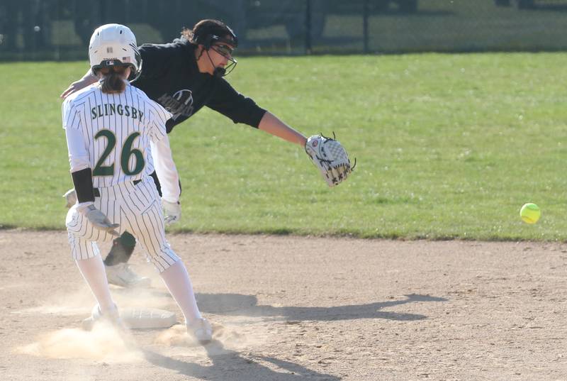 St. Bede's Emma Slingsby rounds second base as the ball gets by Midland's Sophia Coccia on Thursday, March 21, 2024 at St. Bede Academy.