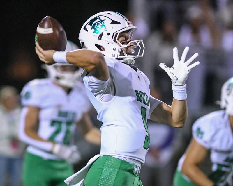 York's Dominic Alfano (9) tries a pass play during the game on Friday Oct. 10, 2025, while traveling to take on Downers Grove North High School.