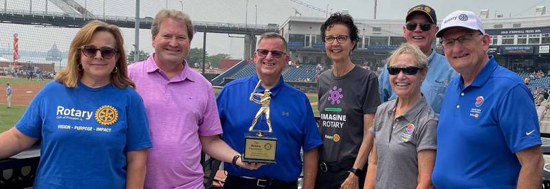 (Left to right); Princeton Rotarians Cathy Foes, Tim Remy, Wayne Peacock, former District Governor Laura Kann, District 6420 Foundation Chair Kathy Kwiatt-Hess, World Series of Giving organizer James MacMurdo, and District Governor Dave Emerick