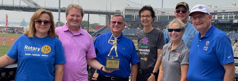(Left to right); Princeton Rotarians Cathy Foes, Tim Remy, Wayne Peacock, former District Governor Laura Kann, District 6420 Foundation Chair Kathy Kwiatt-Hess, World Series of Giving organizer James MacMurdo, and District Governor Dave Emerick