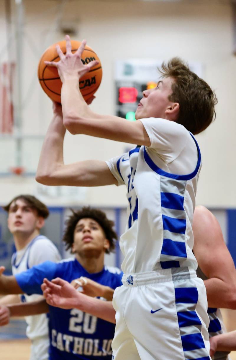 Princeton's Jackson Mason shoots against Newman Friday night at Prouty Gym. The Tigers won 60-46.