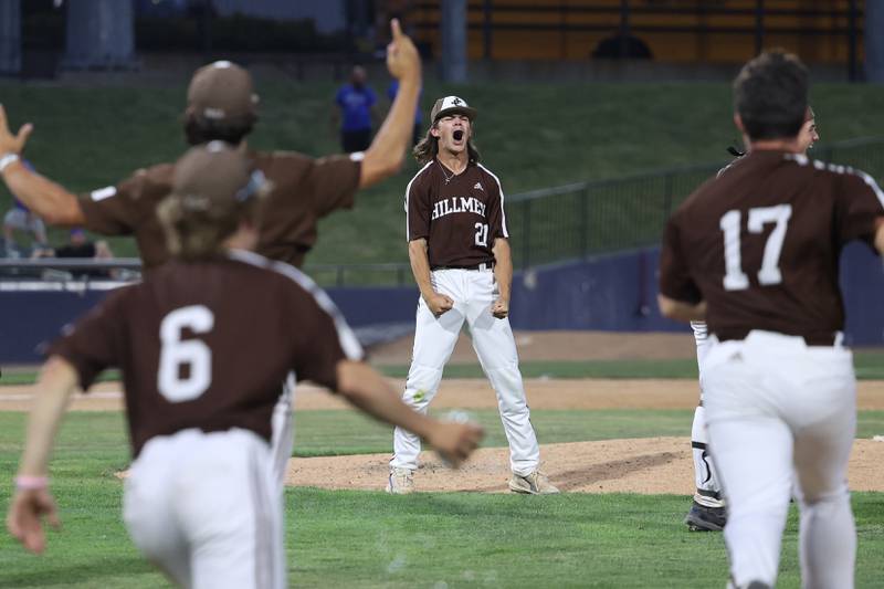 Joliet Catholic’s Michael Tuman, center, reacts after the game ending out to defeat Columbia 4-2 in the IHSA Class 2A State Championship on Saturday, June 3, 2023 in Peoria.