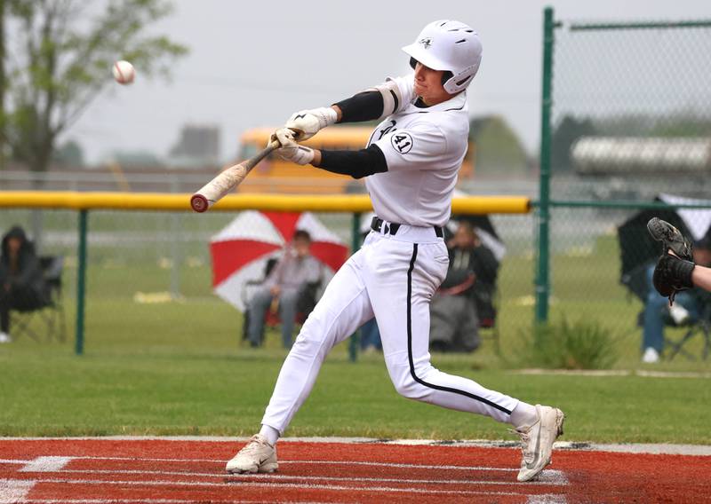 Kaneland's Aidan Whildin makes contact Tuesday, May 12, 2026, during their game against La Salle-Peru at Kaneland High School in Maple Park.