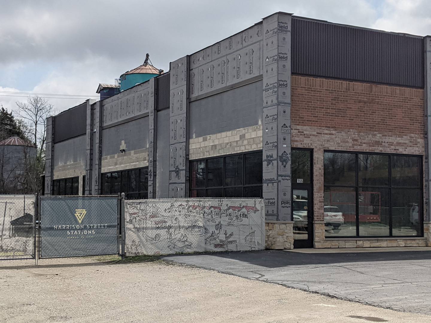 A training and group fitness facility that plans to open in a portion of an industrial building along South Harrison Street in downtown Oswego will receive financial assistance from the village in the face of substantial renovation costs.

The proposal is part of a bigger project to redevelop that portion of Harrison Street. Plans also call for small retail shop spaces, food trucks with a pavilion and a recreational area along with a dog-friendly bar.